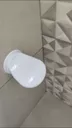 Foto da cliente: Pouso de Pé instalado na parede do box